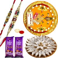 Wonderful Pooja Thali, Yummy Kaju Katli, Gift Voucher from Pantaloons with 2 free Rakhi, Roli Tilak and Chawal