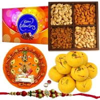 Lovely Brotherly Love Gift of Cadbury Celebration Chocolate Pack, Mixed Dry Fruits, Haldiram Kesar Peda, Shree Thali and 1 Trendy Zardoji Rakhi with Free Roli Tika and Chawal