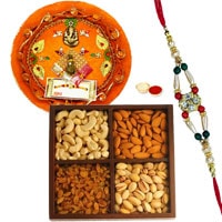 Amazing Rakhi Special Gift of Mixed Dry Fruits and Pooja Thali along with Rakhi for your Loving Brother