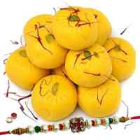Gorgeous Arrangement of Haldiram Kesaria Pedas with One Free Rakhi, Roli Tilak and Chawal for your Caring Brother