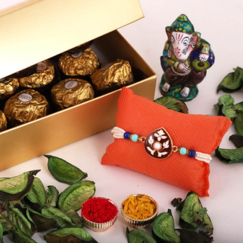 Beautiful Combo of Rakhi, Ferrero Chocolates, Roli Chawal and Rakhi Card