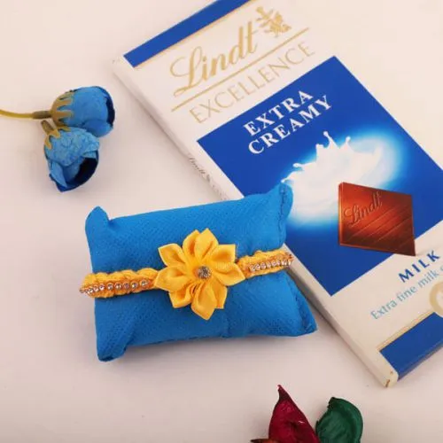 Tasty Lindt Bar N Fancy Rakhi with Free Roli Chawal, Wishes Card