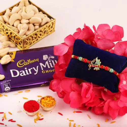 Attractive Combo of Rakhi, Cadbury Dairy Milk and Cashews