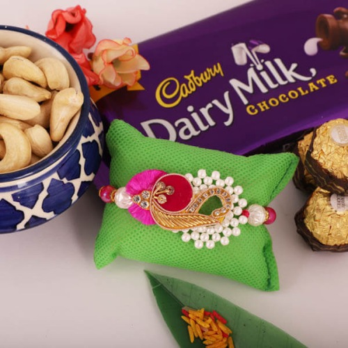 Charming Combo of Rakhi, Chocolates and Crunchy Nuts