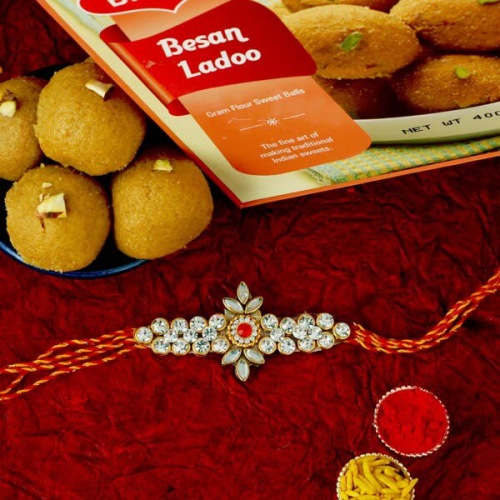 Classic Gift of Rakhi, Besan Laddoo, Free Roli Chawal and Message Card