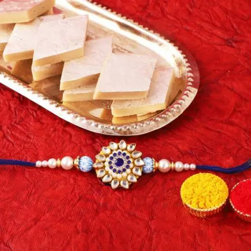 Appealing Rakhi Gift with Kaju Katli, Free Roli Chawal and Wishes Card