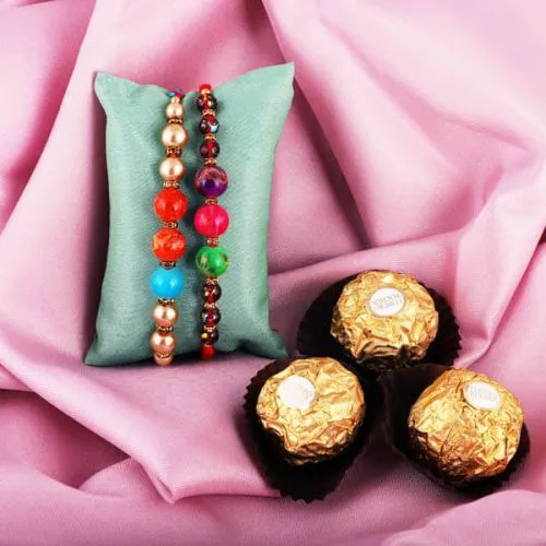 Classic Gift of 2 Rakhis, Ferrero Rocher, Roli Tika and Card