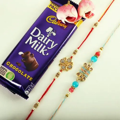 Auspicious Set of 2 Rakhis, Roli Tilak, Free Card N Cadbury Dairy Milk