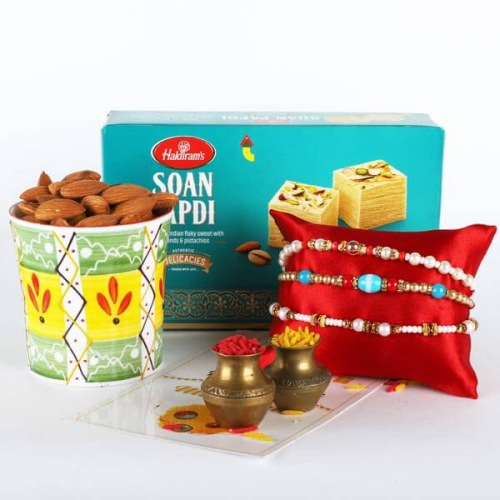 3 Lovely Rakhis, Soan Papdi, Almonds, Rakhi Card N Roli Chawal