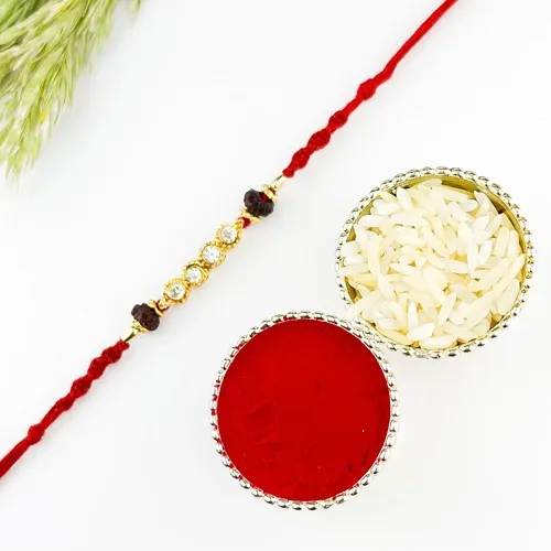 Antique Look Rakhi with Red Moli n Stone
