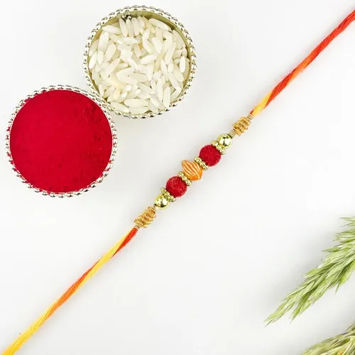 Kalash Rakhi with Glaring Red n Gold Beads