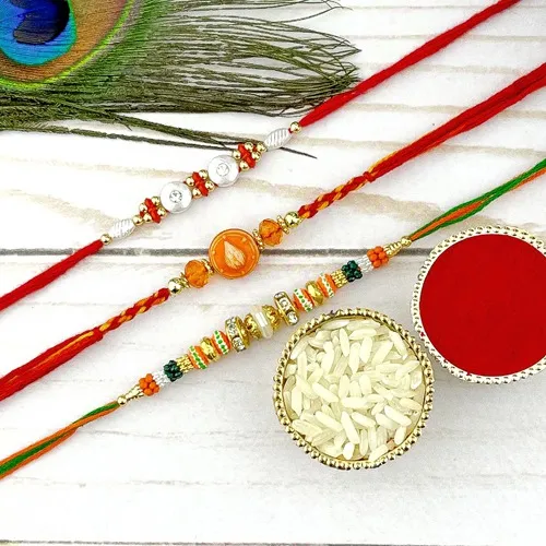 Awesome Trio of White n Shiney Beads with Kalash Rakhi