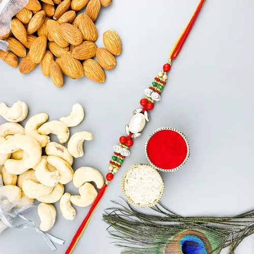 Pearl Rakhi Pick with Cashew n Almonds