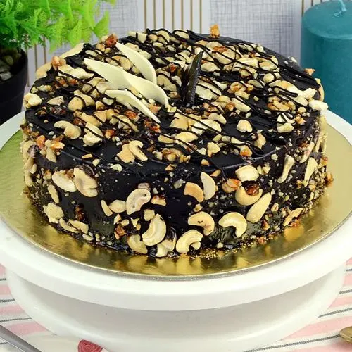 Deliver Rounded Chocolate Fruit N Nut Cake