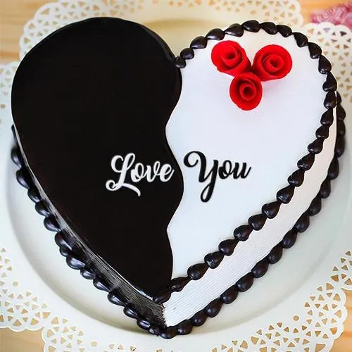Sumptuous Propose Day Gift of Chocolate Vanilla Fusion Cake in Heart Shape