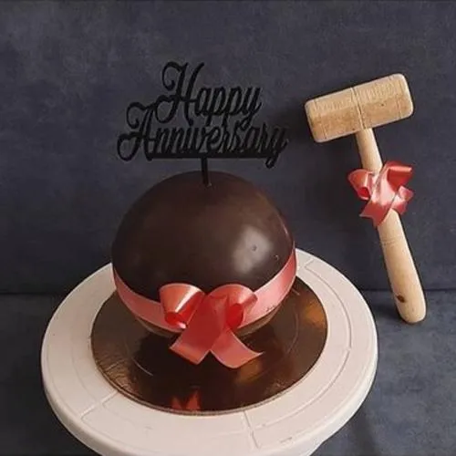 Ambrosial Round Chocolate Pi�ata Cake with Hammer