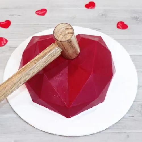 Delicious Red Heart Shape Pi�ata Cake with Hammer