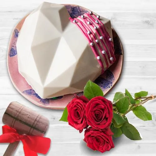 Sumptuous White Heart Pi�ata Cake with Hammer n Red Roses