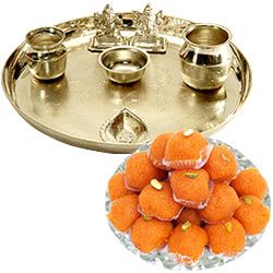 Sending Silver plated Puja Thali with Lakshmi Ganesha N Ghee Ladoo