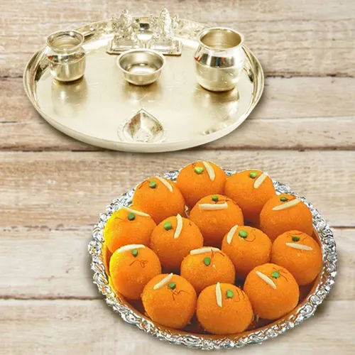 Sending Silver plated Puja Thali with Lakshmi Ganesha N Ghee Ladoo