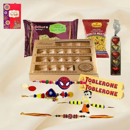 <font color=#FF0000>Haldiram</font>s Ambrosial Assortment with 1 Set Bhaiya Bhabi Rakhi, 2 Kids Rakhi and Roli Tilak Chawal