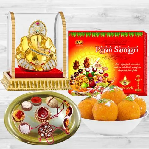 Alluring Bhai Dooj Gift of Puja Thali with Ladoo Samagri n Ganesh Idol