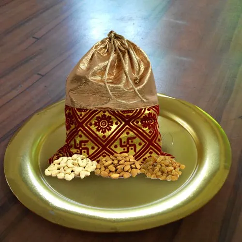 Delectable Mixed Dry Fruits Potli with Decorated Thali in Gold Color