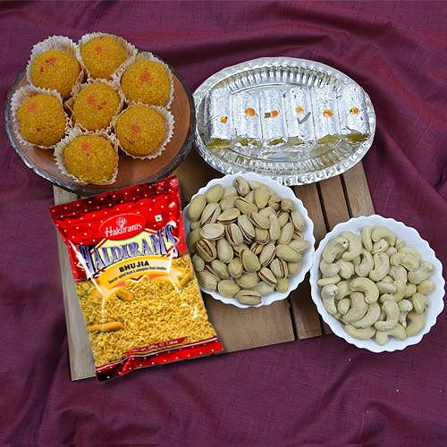 Tasty Assortment of Haldiram Mithai n Snacks with Dry Fruits