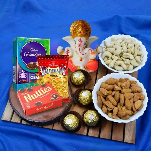 Enticing Ganpati Idol with Dry Fruits, Chocolates n Snacks