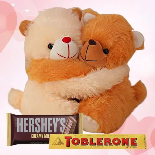 Cute Cuddling Teddy, Toblerone n Hersheys Chocolate Gift Combo