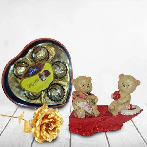 Admirable Loving Couple showpiece with Sapphire Heart Chocolate Box n Golden Rose