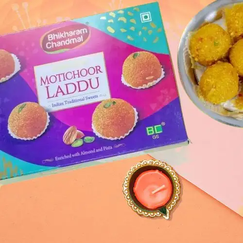 Festive Laddu With Diwali Diya