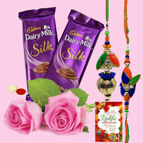 2 Dairy Milk Silk with Bhaiya Bhabhi Rakhi, 2 Pink Roses & Free Rakhi Card