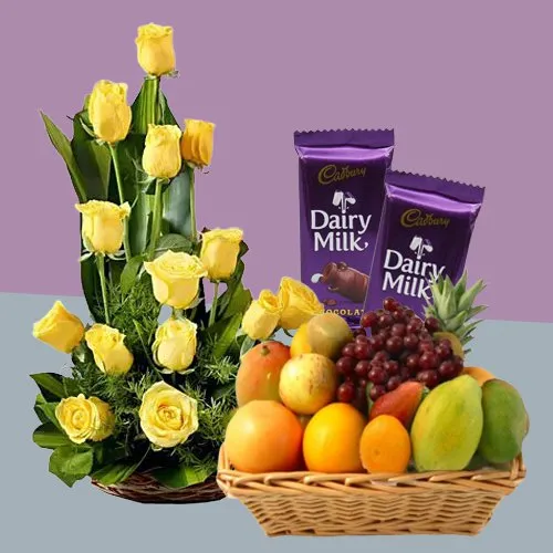 Order Mixed Fruits Basket with Roses Arrangement and Dairy Milk Silk