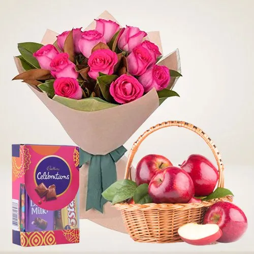 Shop for Pink Roses with Apples Basket and Cadbury Mini Celebrations