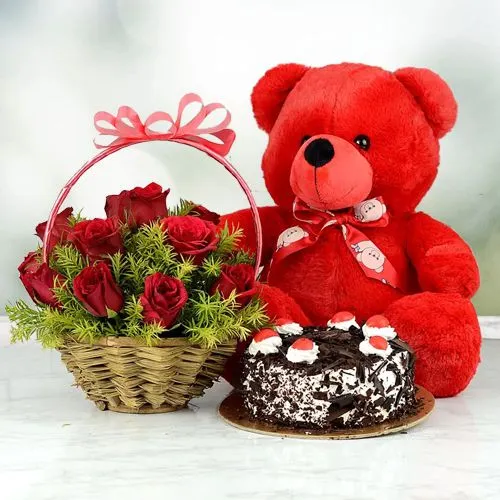 Marvelous Red Rose Bouquet with Black Forest Cake N Teddy to Varanasi, India