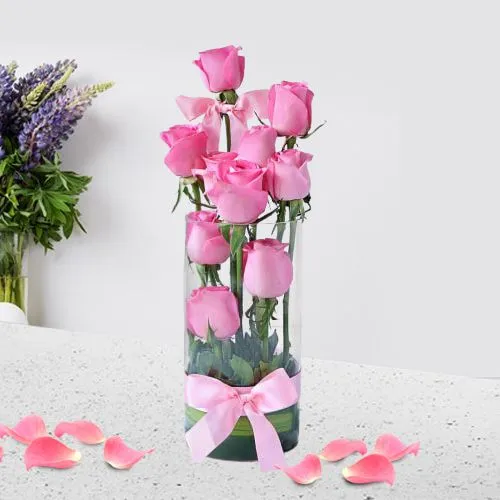 Beautiful Display of Pink Roses in Glass Vase