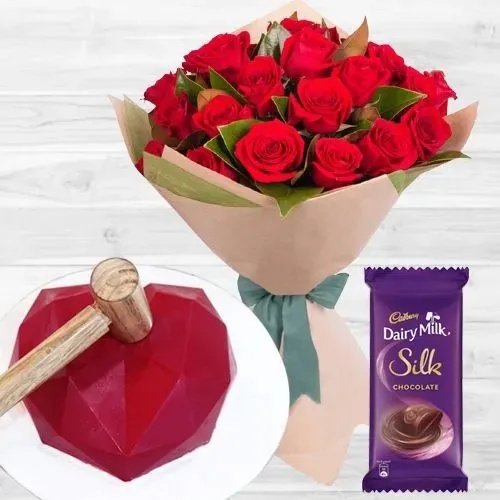 Splendid Combo of Red Roses Bouquet, Bleeding Love Hammer Cake n Cadbury Silk 	