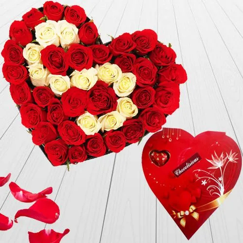 Hearty Arrangement of Red n White Roses with Heart-Shape Handmade Chocolates Box