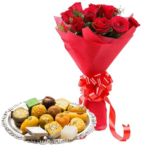 Buy 12 Red Roses with Sweets of 500 gms.