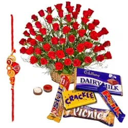 Appealing Assortment of Cadburys Chocolates with Two Dozen Red Roses