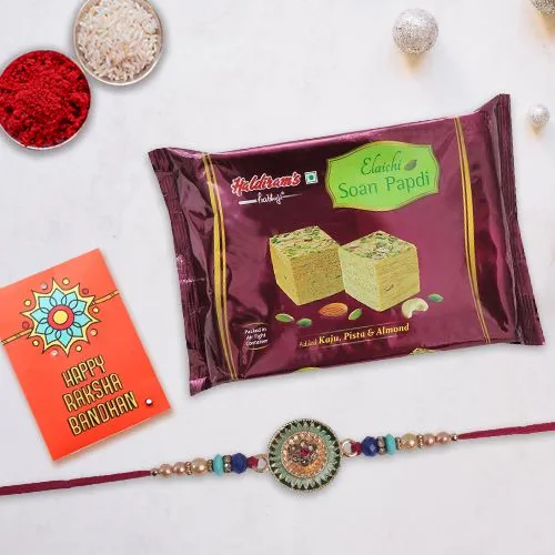 Rakhi with <font color=#FF0000>Haldiram</font> Soan Papri