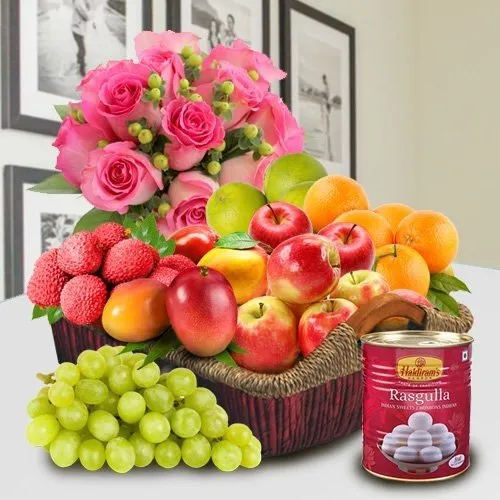 Basket Hamper of Fresh Fruits, Haldiram Rasgulla and Pink Rose Bouquet for your Mom