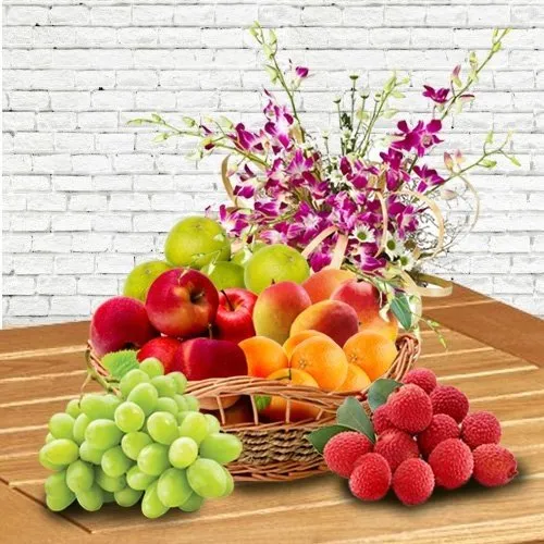 Fresh Fruits Basket decorated with Orchids for Mummy