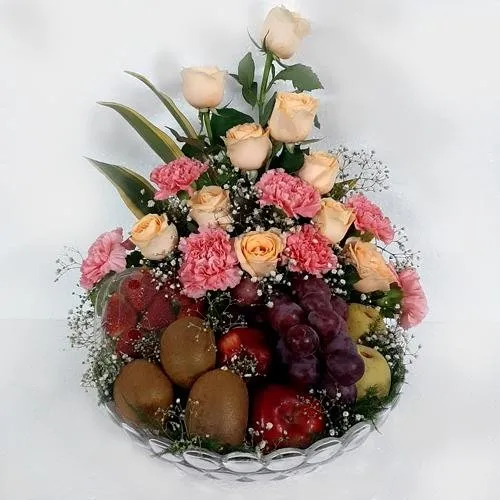 Wonderful Fruits with Orange Roses n Pink Carnations in Glass Vase