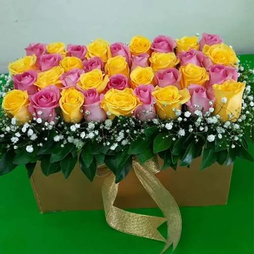 Buy Bed of Pink n Yellow Roses in Box
