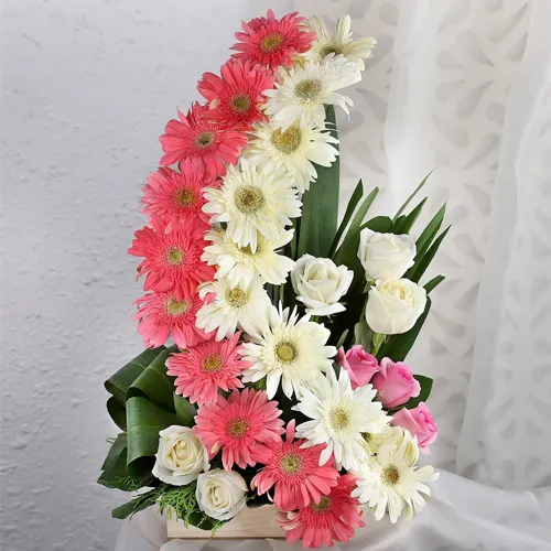 Special Arrangement of 7 Roses and 8 Gerberas Designer to India.
