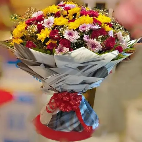 Send Tissue Wrapped Colorful Floral Arrangement