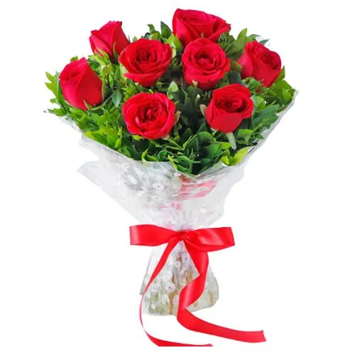 Send Red Roses Tissue Wrapped Bouquet Tied with a Ribbon