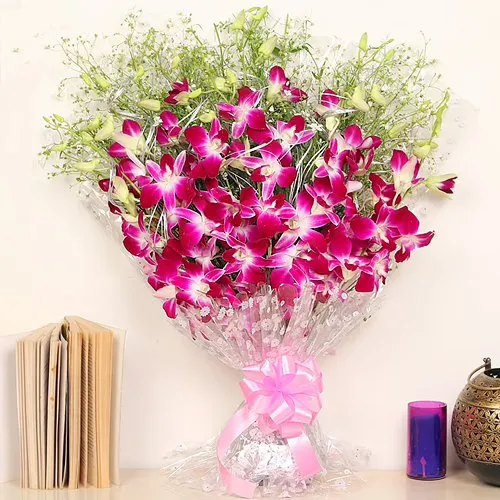 Send Orchid Tissue Wrapped Bouquet